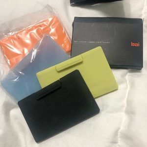 NIB Rubber Card Holder